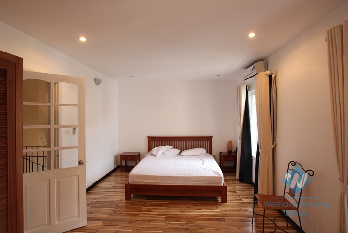 Bright duplex apartment for lease in Westlake area, Hanoi, fully furnished.